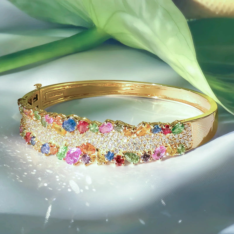 Stylish Multi-Sapphire Bangle Bracelet with Pear and Round Cuts