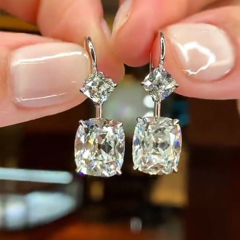 A stunning pair of 8.37ctw cushion cut earrings -JOSHINY