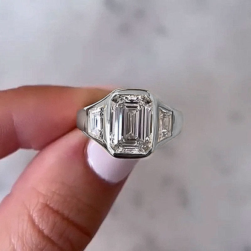 4.5ct three stone emerald cut all over bezel set yellow gold engagement ring