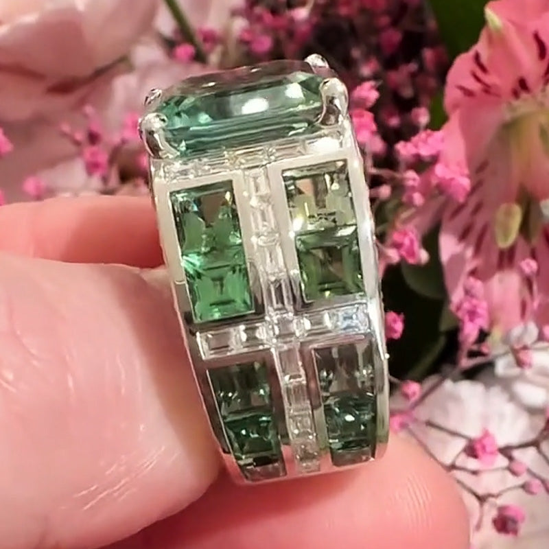 7.86ctw emerald cut green tourmaline and sapphire engagement ring