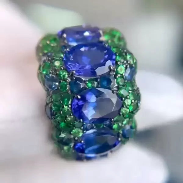 12ctw Blue Oval Cut and Green Round Cut Two Tone Pave Set Ring